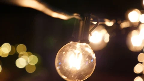 Camera moving along a long string of lights Video stock 85561680