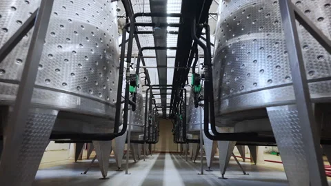 Camera moving along metal cisterns for wine production processes, stainless Stock-Footage 316831571