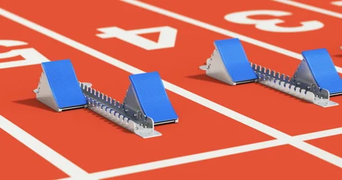 Camera moving along row of starting blocks on the athletic tracks 動画素材 333814770