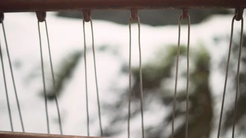 Camera moving around the bridge fence in winter close up Stock Footage 135083763