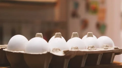 Camera moving around a cartoon box with white eggs 스톡 동영상 160433227