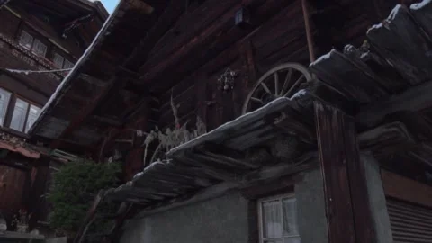 Camera moving around snow covered chalet Video stock 291881402