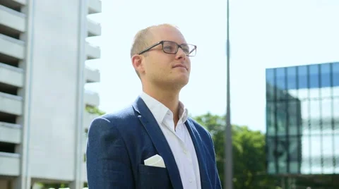 Camera moving around standing businessman. portrait. thinking. career future Stock Footage 40731397