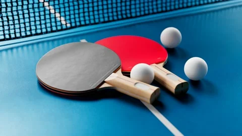 Camera moving around the table tennis set. Ping pong balls, paddles and net. Stock Footage 133452004