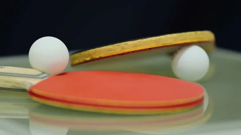 Camera moving around the table tennis set. Ping pong balls, paddles. Stock Footage 233997665