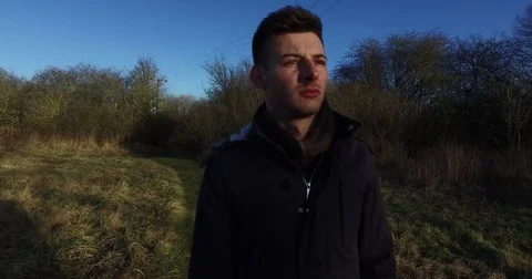 Camera moving around young man with "Overcome" floating - 2 Stock-Footage 73483959