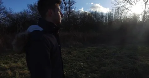 Camera moving around young man with "Overcome" floating - 4 Stock-Footage 73484050