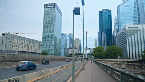 Camera moving backward capturing La Defence buildings in Paris, France. Stock Footage 245460689