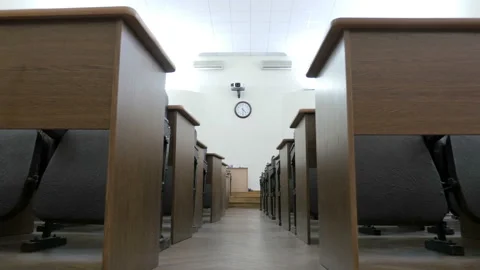 Camera Moving  Between Empty Desks In Conference Hall, Lecture Hall Stock Footage 139617459