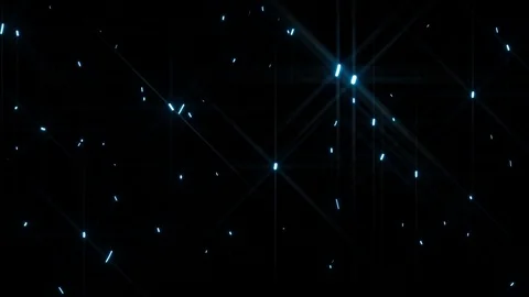 Camera moving in cloud of falling magic bright blue particles with long motion Video stock 84257107