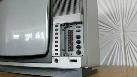 Camera moving to control panel of old TV Stock Footage 96245789