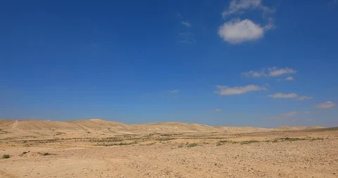 Camera moving counter clockwise on wide panorama of desert Stock Footage 104271398