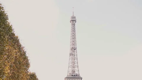 Camera moving down from the top of Eiffel tower in Paris, France - famous sight. Stock Footage 86348041