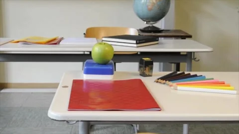 Camera moving in empty school room. Interior of empty classroom with wooden Stock Footage 256720285