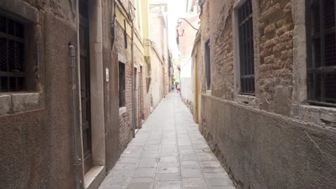 Camera moving forward in narrow alley Stock Footage 293845723