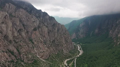 Camera moving forward over mountain road revealing epic valley landscape Stock Footage 289641704