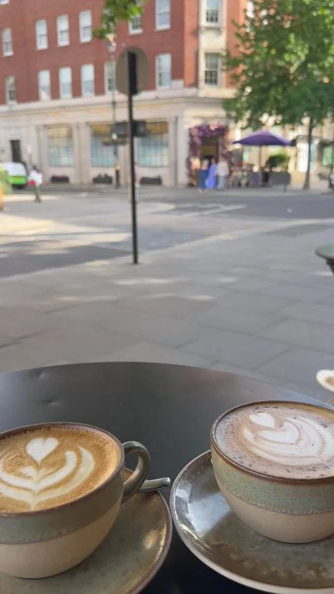 Camera Moving Forward Past Coffee Cups Revealing London Street View Vídeos de archivo 335903483
