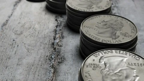Camera moving over coin stacks Stock Footage 150375269