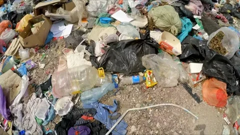 The camera is moving over the dump. Slow motion. Stock-Footage 88340628