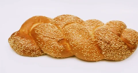 Camera moving parallel of the Shabbat challah Stock Footage 117754410