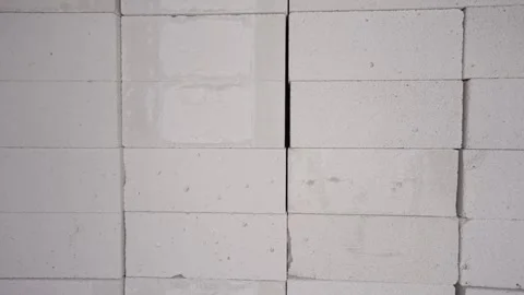 Camera moving right showing stacks of concrete blocks Stock Footage 288148845