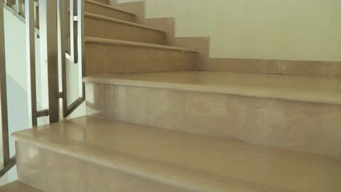 The camera is moving up in the stairs in a multi-story building Video stock 142493112