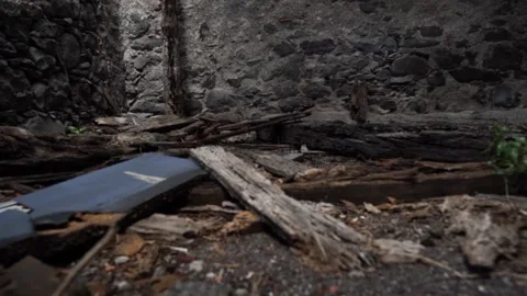 Camera moving through abandoned building with rubble Stock Footage 293159215
