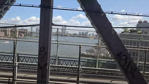 Camera moving  through the Bridge between Manhattan and Brooklyn Stock Footage 282683733