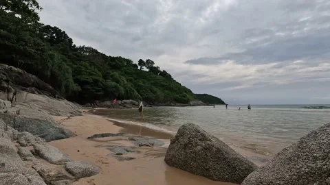 Camera moving through cliffs on tropical beach Stock Footage 220321721