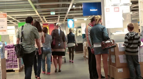 Camera moving through the crowd of customers in Ikea showroom Stock Footage 38644949