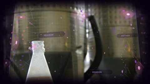 Camera moving toward flask in lab while HUD analyzing sample, particles Stock Footage 331872794