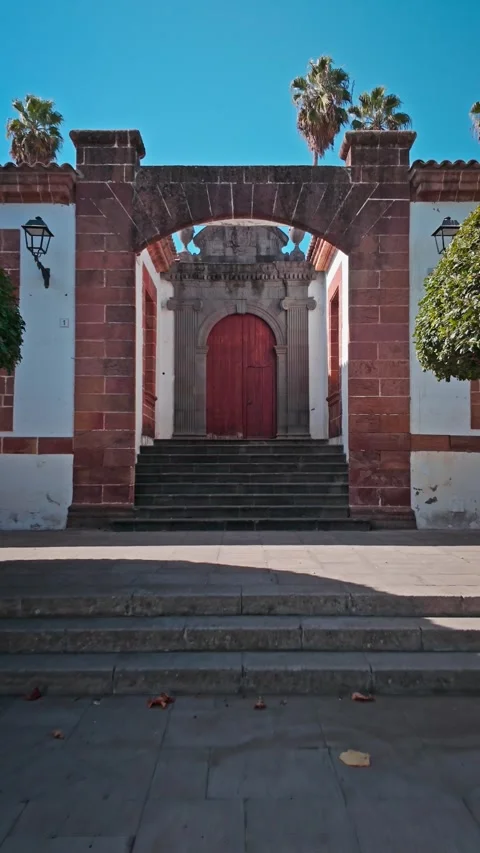 Camera moving towards colonial building facade in Teror, Gran Canaria Stock Footage 294279009