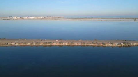 Camera moving towards the road in the middle of lake. Stock-Footage 229548754