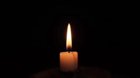 Camera moving towards a rotating candle. Stock Footage 198205428
