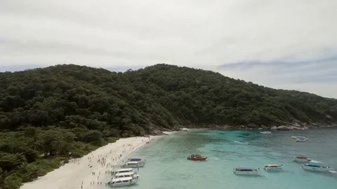 Camera in moving unveil view Tropical beach of Similan Island N8. Boats and Video stock 82819547