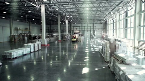 Camera moving at warehouse. Warehouse interior. Camera is moving forward. Stock Footage 67305177