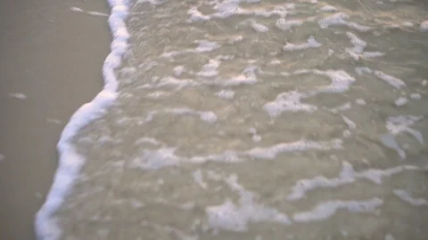 Camera Moving While Calm Waves Are Hitting Tropical Beach Close Up Stock Footage 120330264