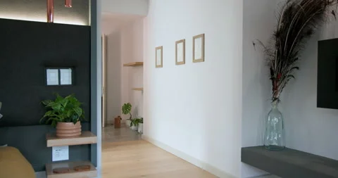 Camera is opening view on double doors and panning right to reveal bed with Stock Footage 314042854