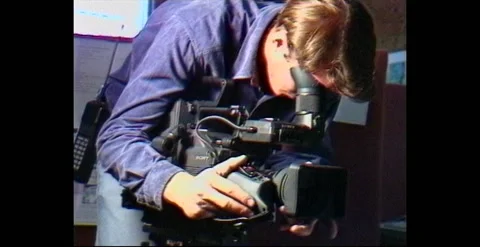 Camera Operator with Betacam SP Camera - (1991) Stock Footage 239832416
