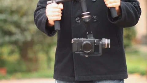 Camera Operator Moving Stabilizer Stock Footage 83169828