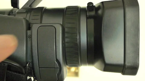 Camera operator using focus wheel on video camera Stock Footage 36156266