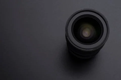 Camera or video lens close-up image on black background Stock Photos
