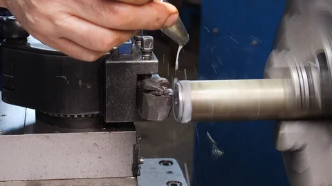 Camera orbiting and zooming on the cutting tool of lathe machine Видео 129736890