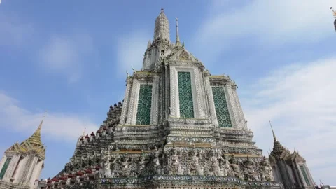 Camera orbits Thonburi Pagoda at Wat Arun, Bangkok, Thailand Stock Footage 319988419