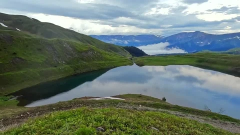 Camera overlooking Karagoli Lake wide shot in Georgia Stock Footage 338426389