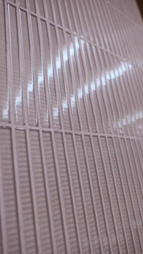 Camera pan across ceramic wall tiles Stock Footage 324533422