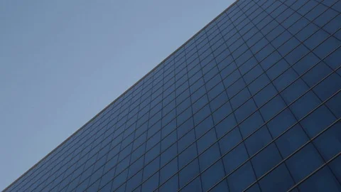 Camera Pan across a clean modernist building facade in Dallas Texas Video stock 89808620