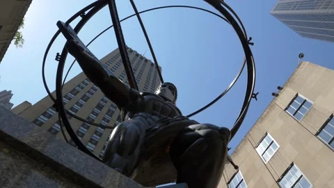 Camera Pan from Atlas with Mask at Rockefeller to St. Patrick’s Cathedral Stock Footage 134853083