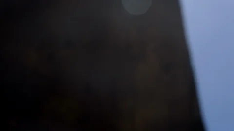 Camera pan from behind a wall to reveal | Stock Video | Pond5