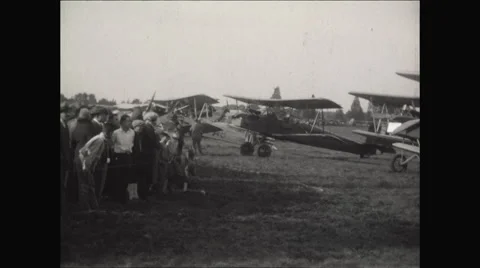 Camera Pan of crowd and Bi-Planes at Airshow  Video stock 56160131